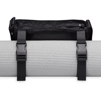 Gaiam Wander Free Yoga Mat Pouch showing the clips around a mat