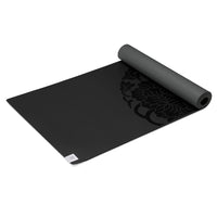 Gaiam Performance Dry-Grip Yoga Mat (5mm) Black top rolled angle