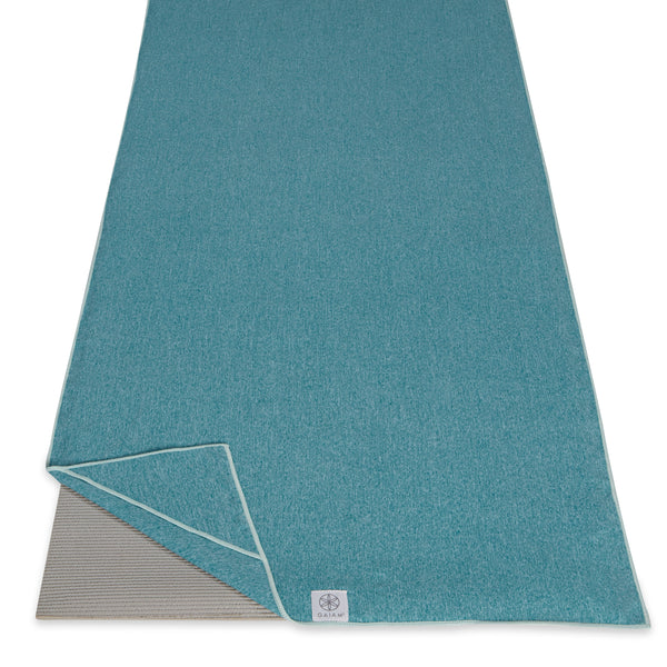 Gaiam Active Dry Yoga Mat Towel Lagoon on mat corner folded back