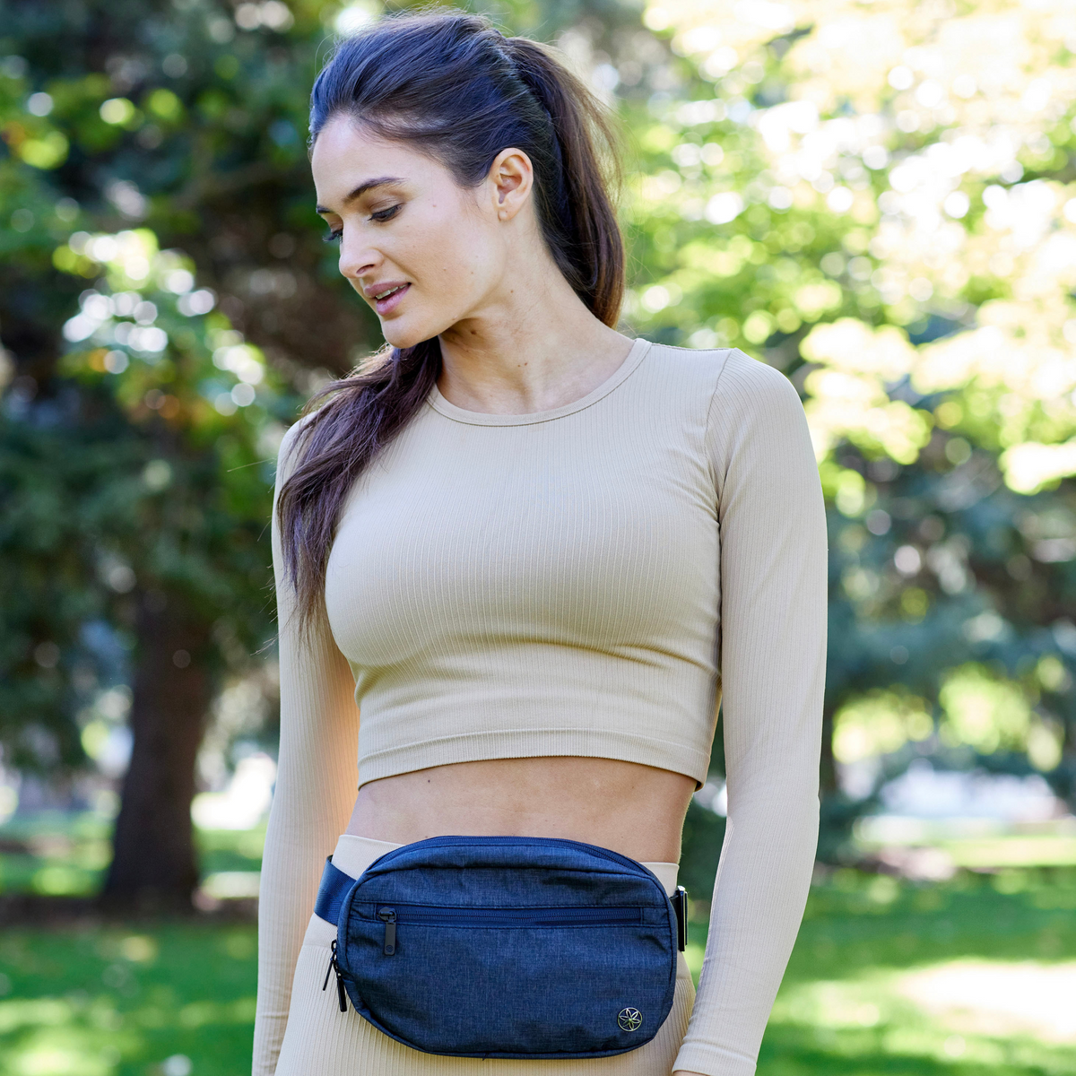 Woman with Get Moving Waist Pack around waist