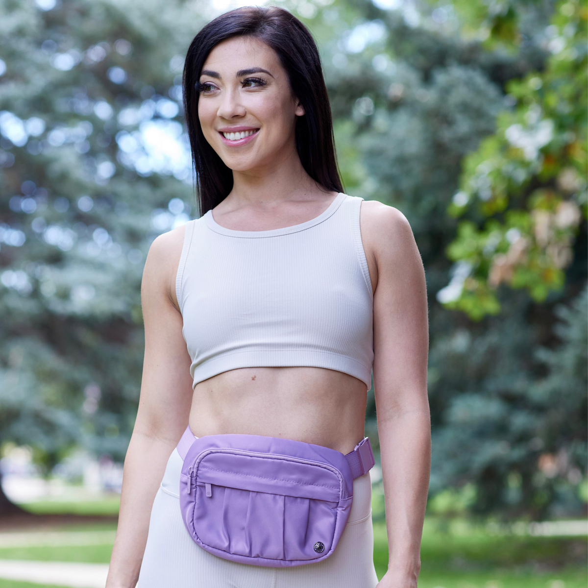 Woman outside with Out & About Waist Pack around waist