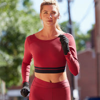 Person outside running while wearing the Womens Sport Running Gloves
