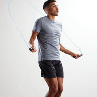 Person jumping-using the Weighted Jump Rope