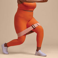 Close image of person performing a Lunge while wearing the POPSUGAR Adjustable Hip Band