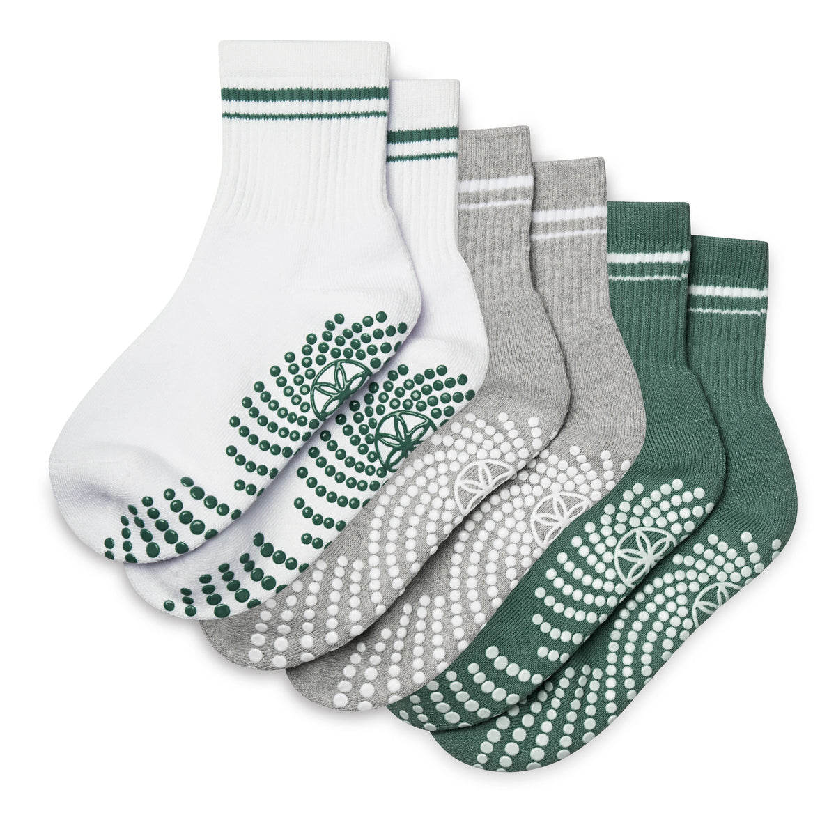 Set of five pairs of socks with unique patterns on a white background