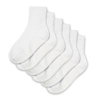 Set of five white socks with textured sole on a white background