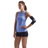 Standing person wearing the Compression Elbow sleeve