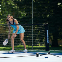 Person standing on the other side if the pickleball net