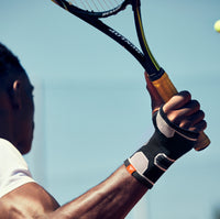 adidas Premium Wrist Support on man playing tennis