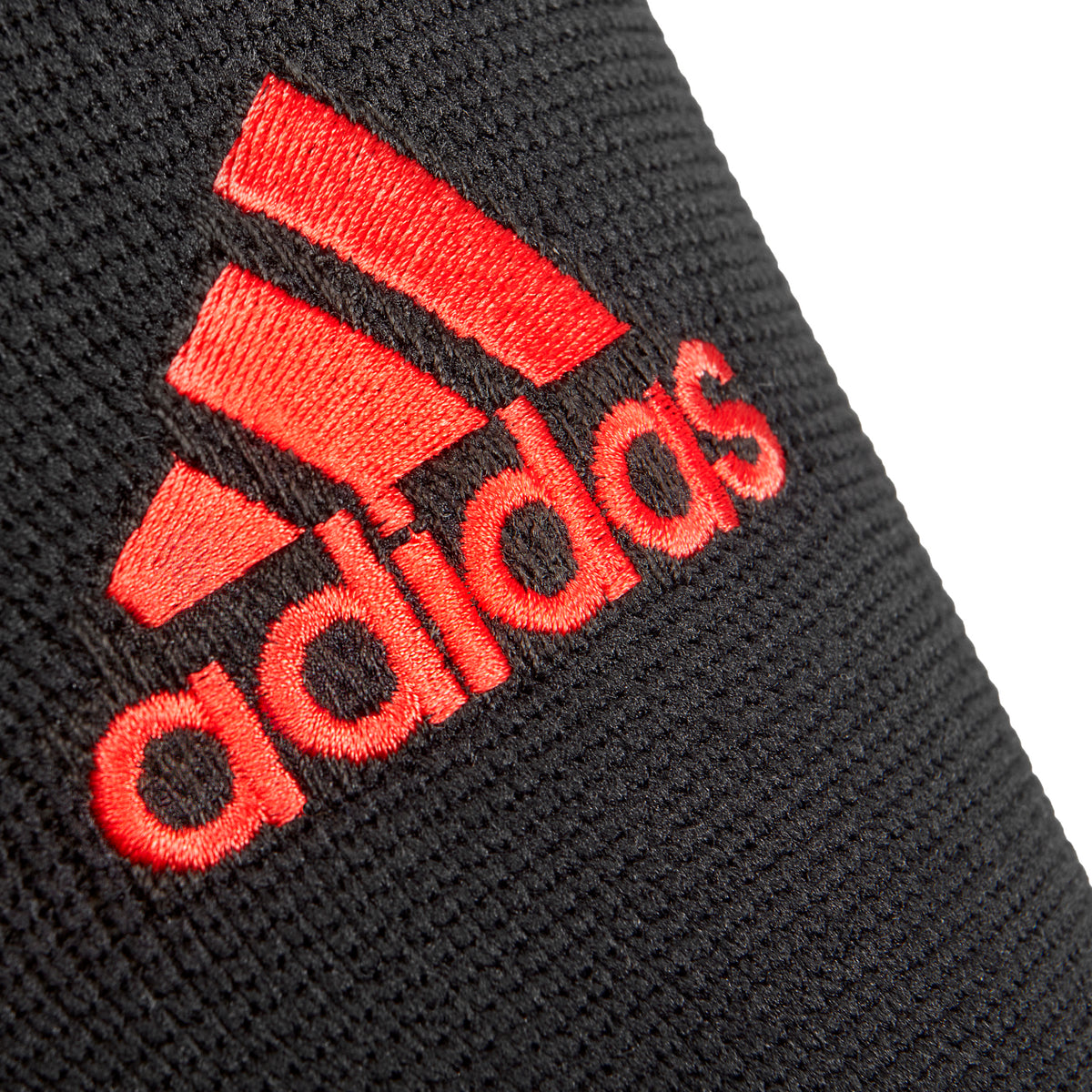 adidas Classic Elbow Support red logo closeup
