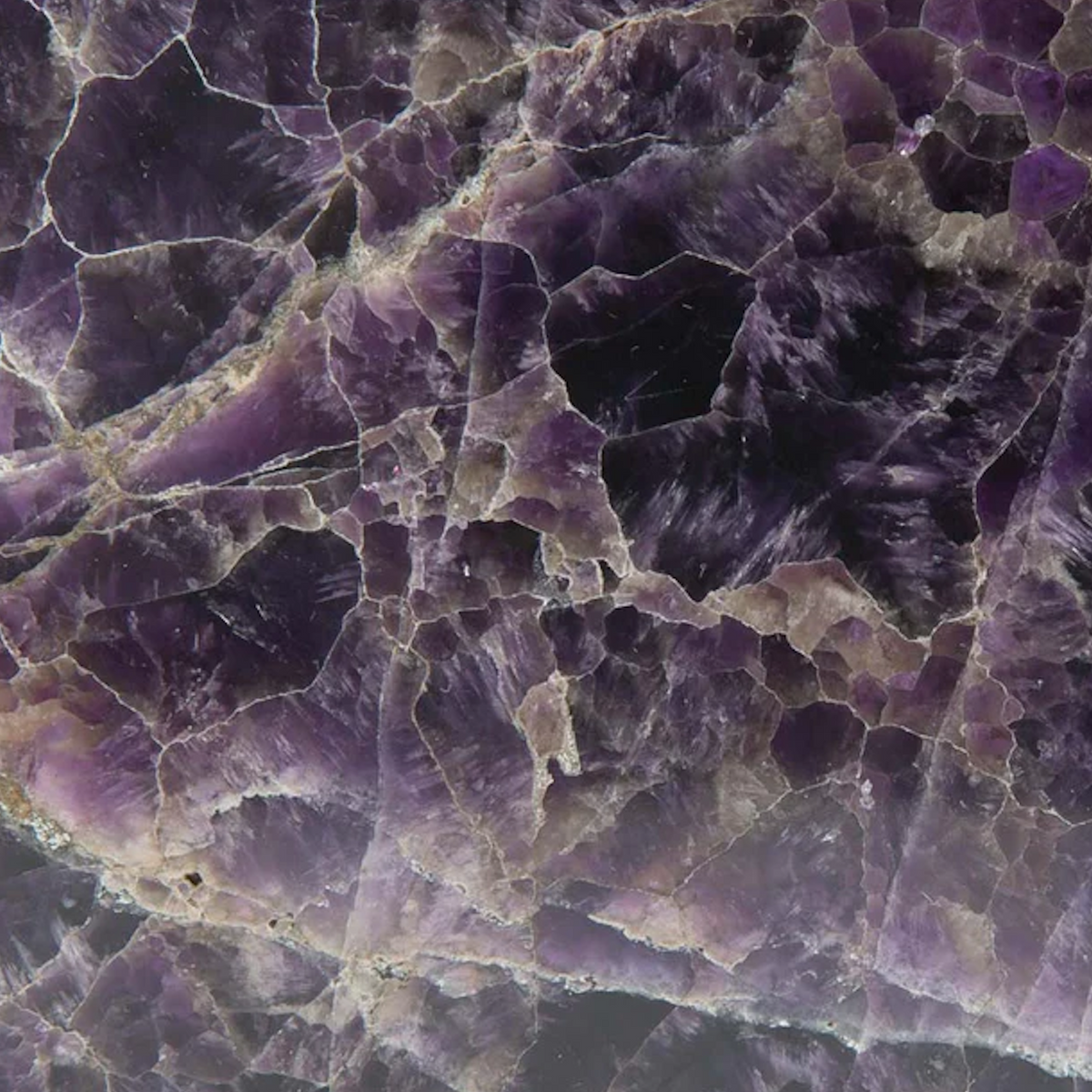 b, halfmoon Palm Crystal Amethyst closeup