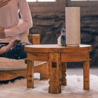honey brown table in meditation room