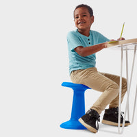 Child sitting on Kids Balance Stool at desk