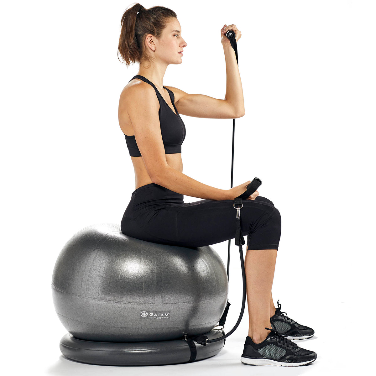 woman using the fitness set upright