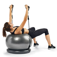 woman using the fitness set laying down
