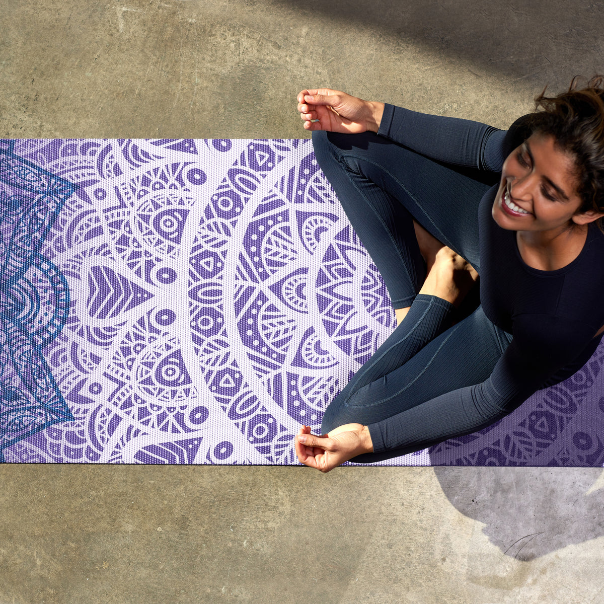 Woman sitting and smiling on Purple Lattice mat