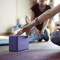 Yoga Essentials Block by a mat