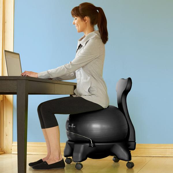 Woman Sitting on the Classic Balance Ball Chair at a desk