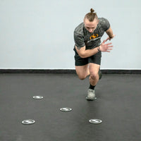 Man working out using the Five Agility Dots