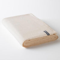 Halfmoon Cotton Yoga Blanket Natural folded up