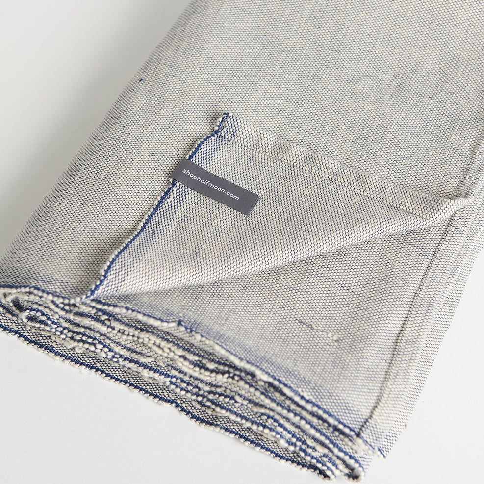 Halfmoon Cotton Yoga Blanket Ink Weave folded with corner back