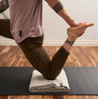 Halfmoon Melange Cotton Yoga Blanket used as knee padding