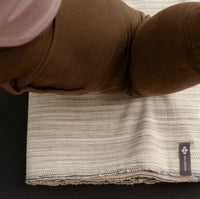 Halfmoon Melange Cotton Yoga Blanket knee on blanket