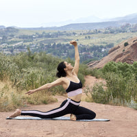 woman in pigeon pose on the Premium Insta-Grip Yoga Mat