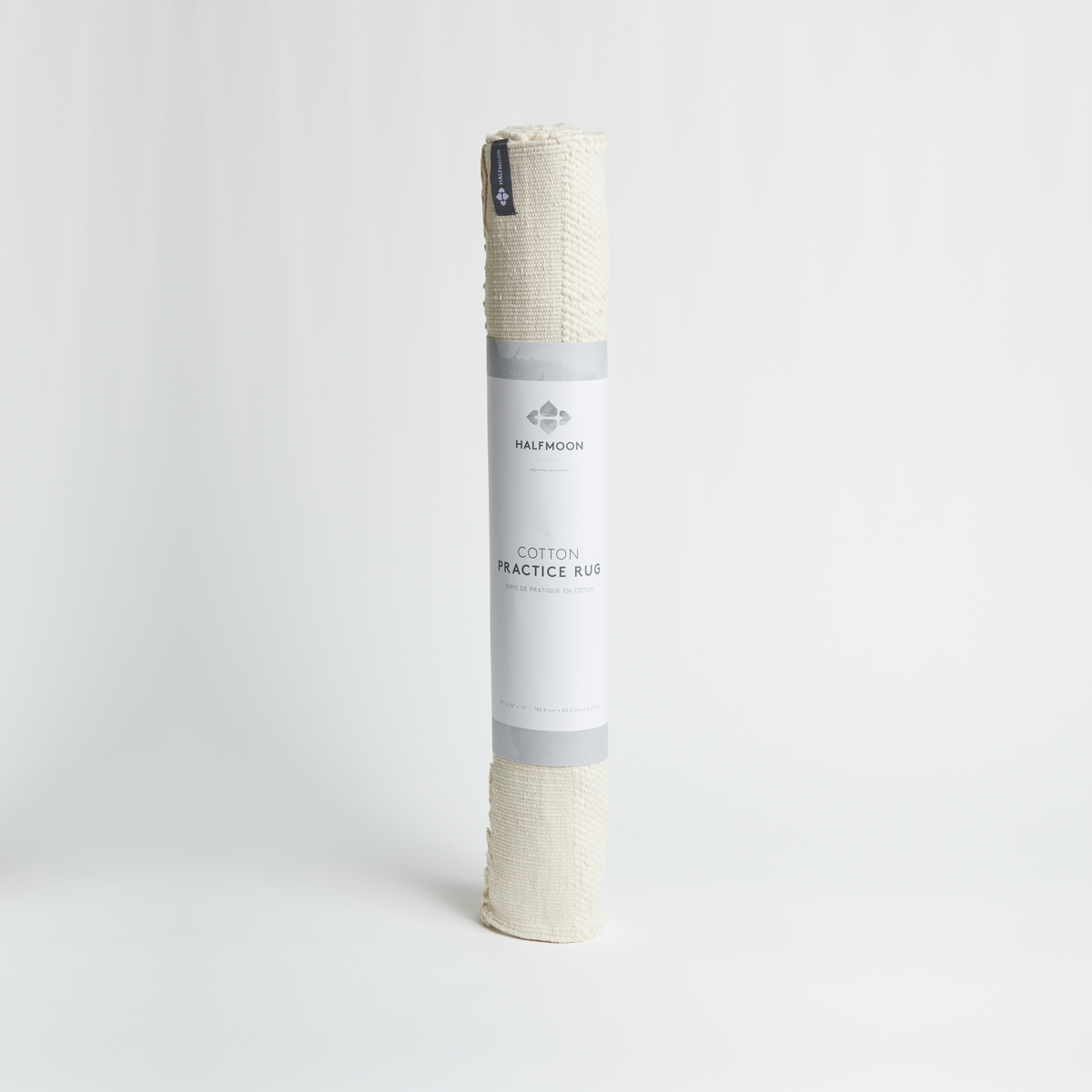 Halfmoon Cotton Practice Rug rolled with packaging