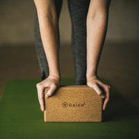 Assisted forward fold with the Gaiam Cork Yoga Brick